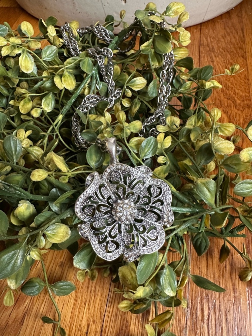 RMN Silver-tone Filigree Floral Pendant Necklace with Rhinestones